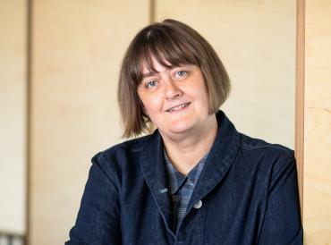 LAMDA's Director Sarah Frankcom smiling at the camera