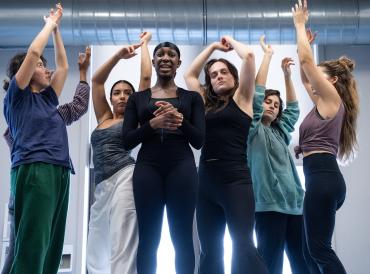 Six students during a rehearsal