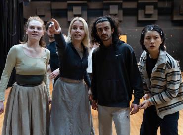 Four LAMDA students in a rehearsal