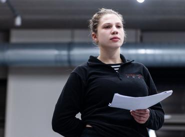 A LAMDA Actor Refresh participant holding a script