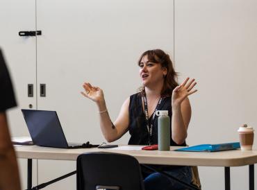 A LAMDA tutor at a desk
