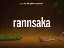 Graphic for rannsaka with the wording 'A ColLAB22 Production - rannsaka' on an orange-brown background with a broken antler and green bushes in the distance