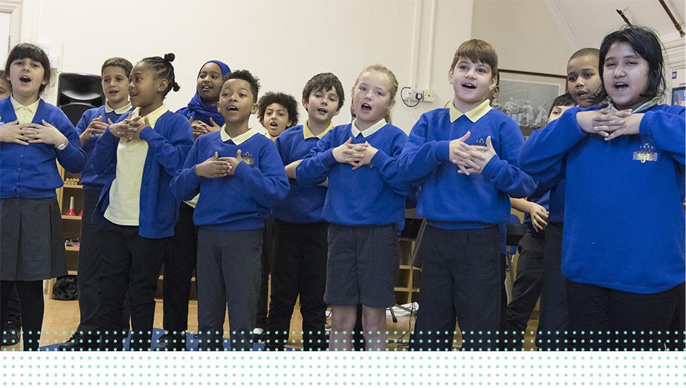 A group of LAMDA learners singing in rehearsal