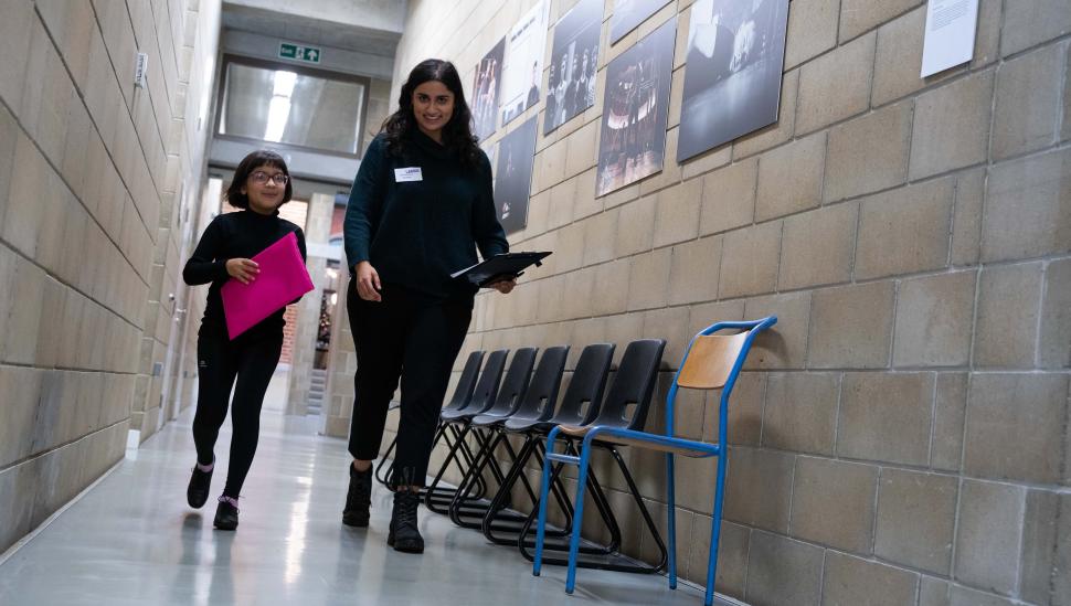 Learner walking to exam room at LAMDA