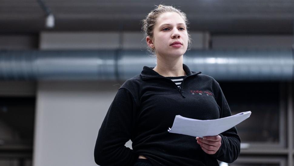 A LAMDA Actor Refresh participant holding a script