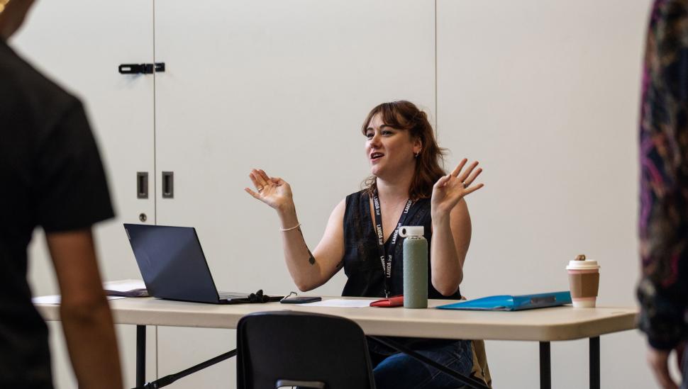 A LAMDA tutor at a desk