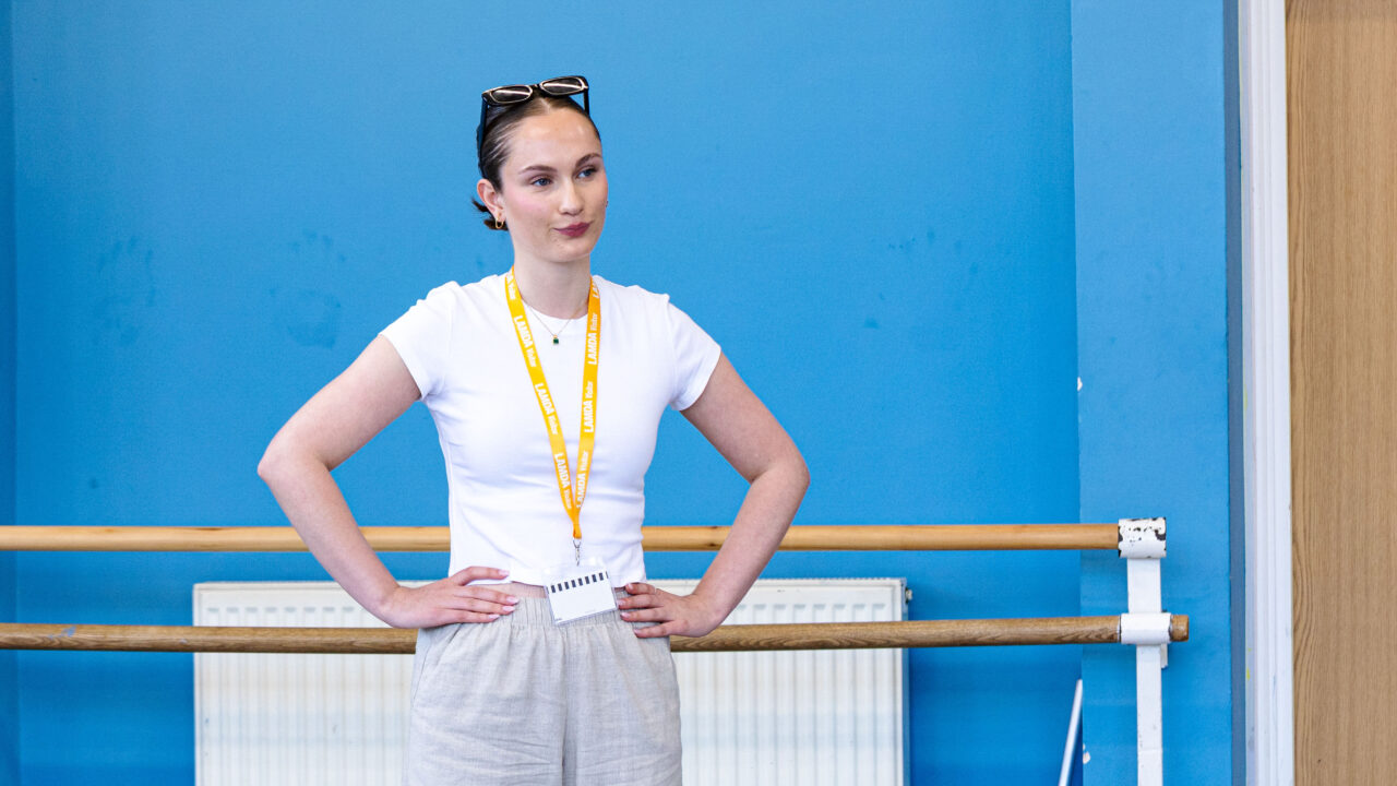 A teacher stands alone during a teacher course