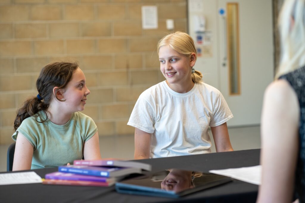 Two learners in an exam room