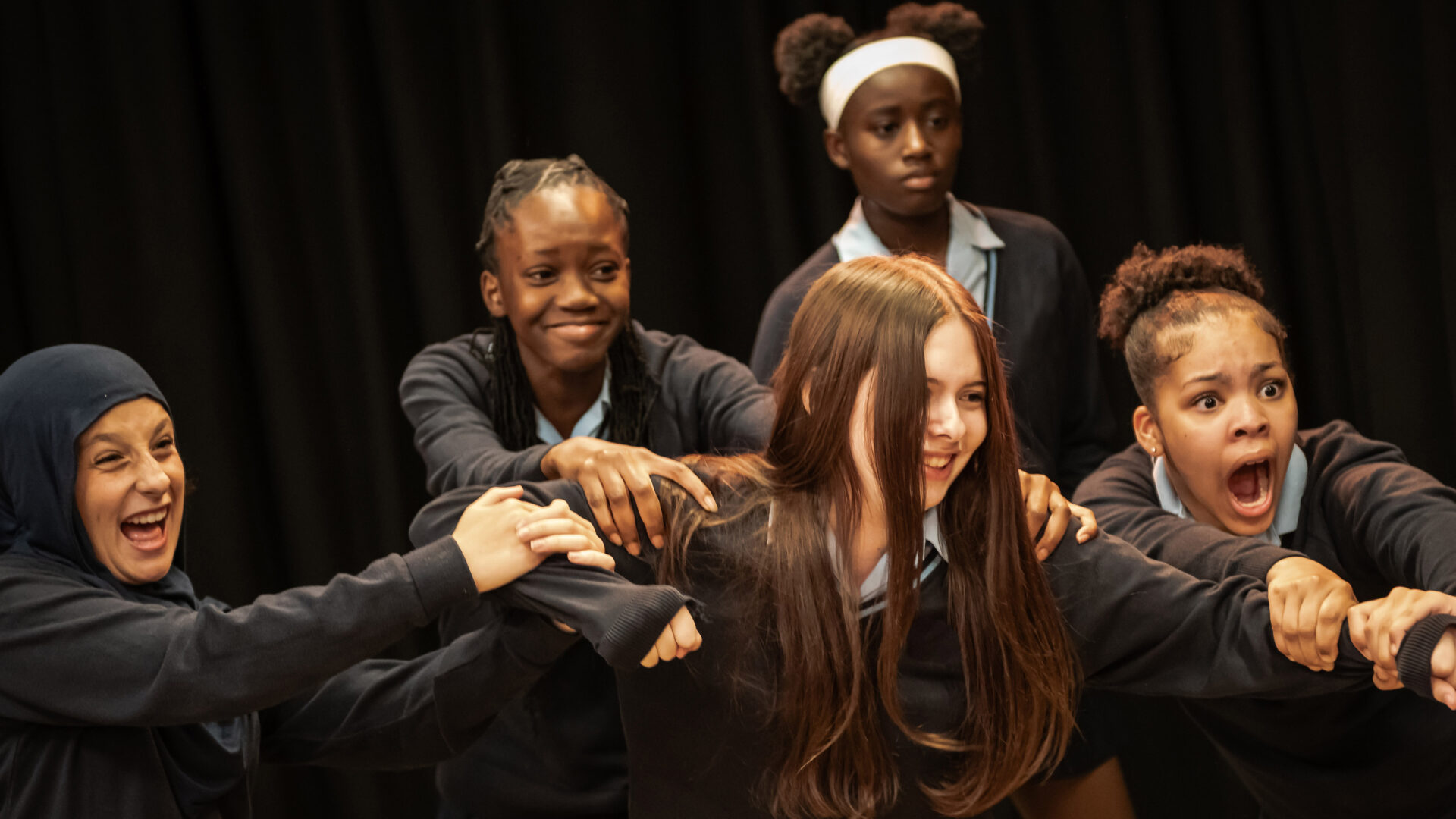 A group of learners perform together