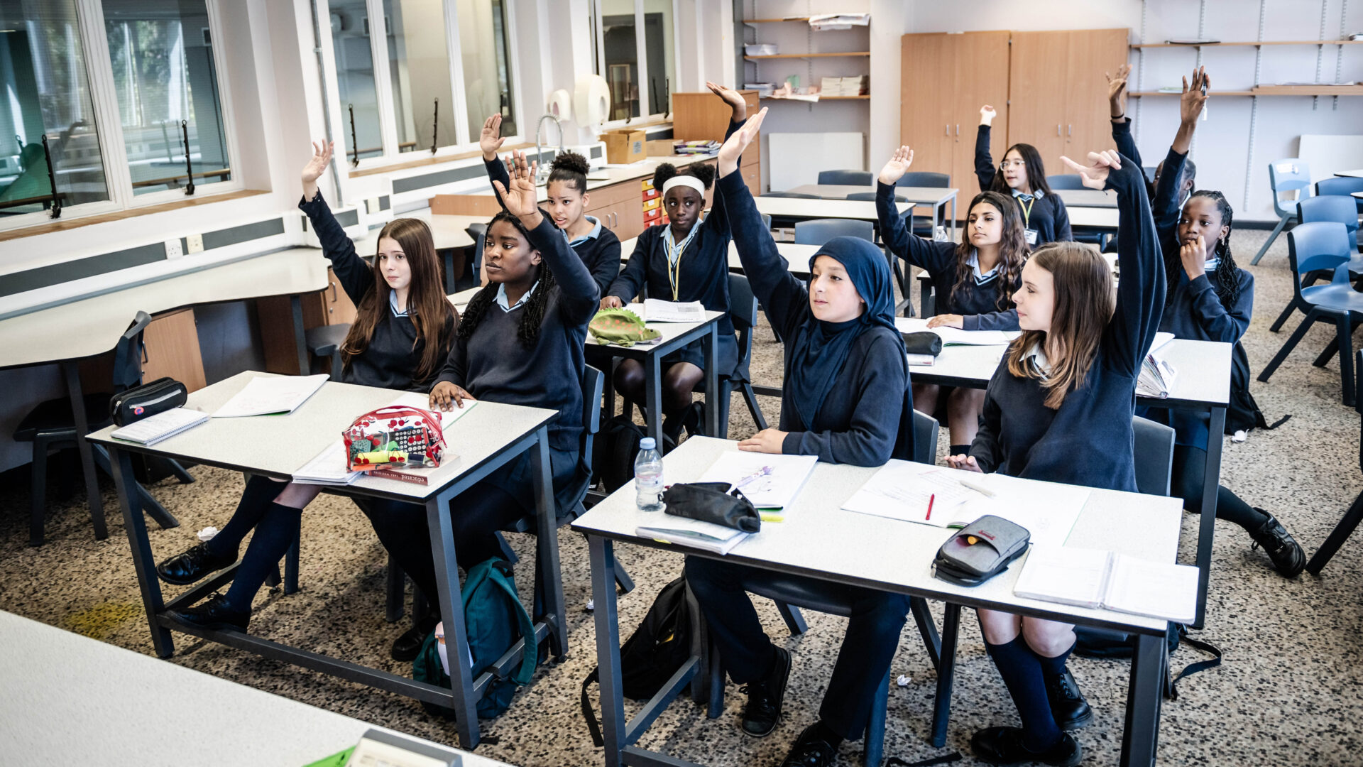 Students work together at their desks