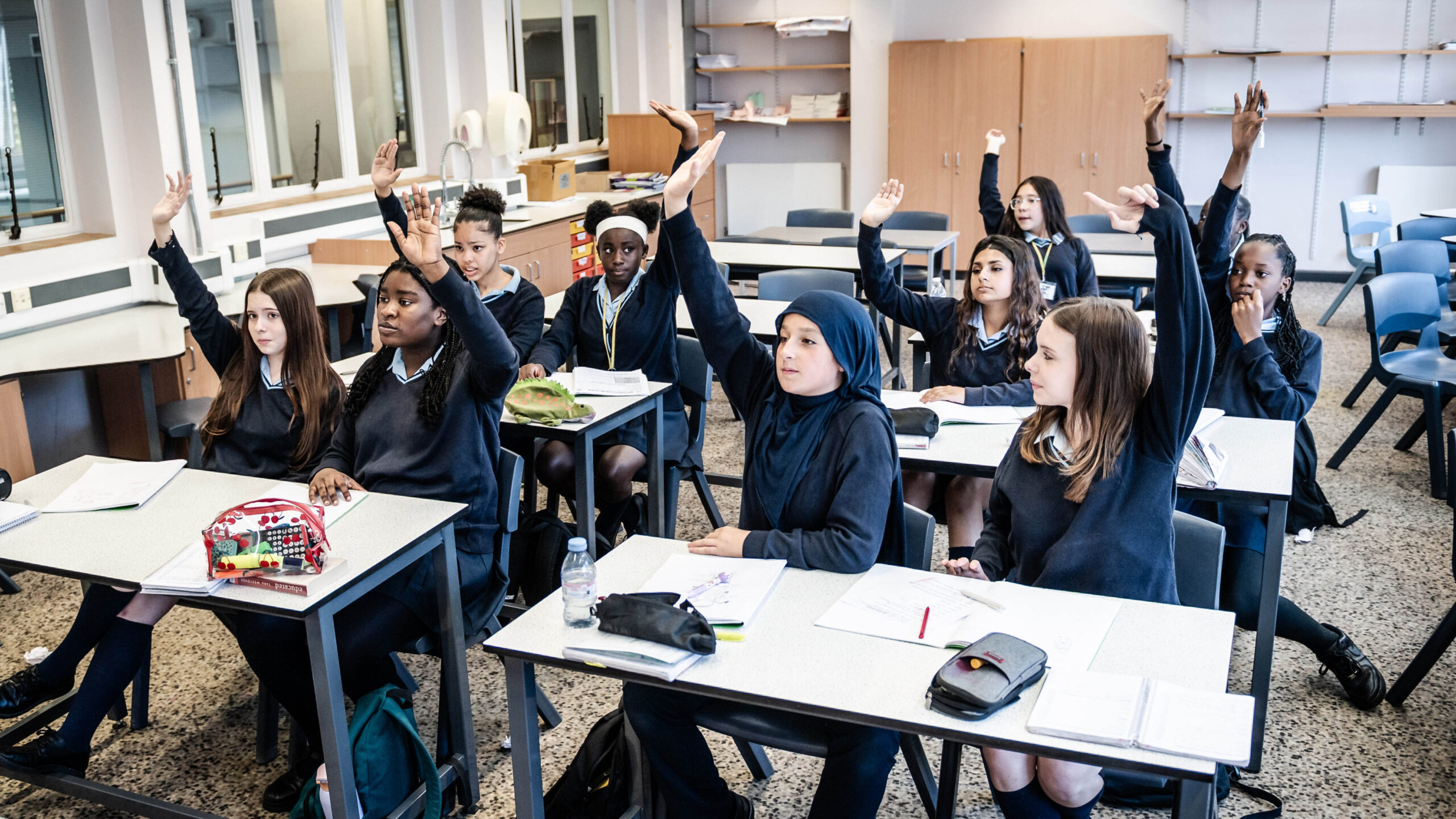 Students work together at their desks