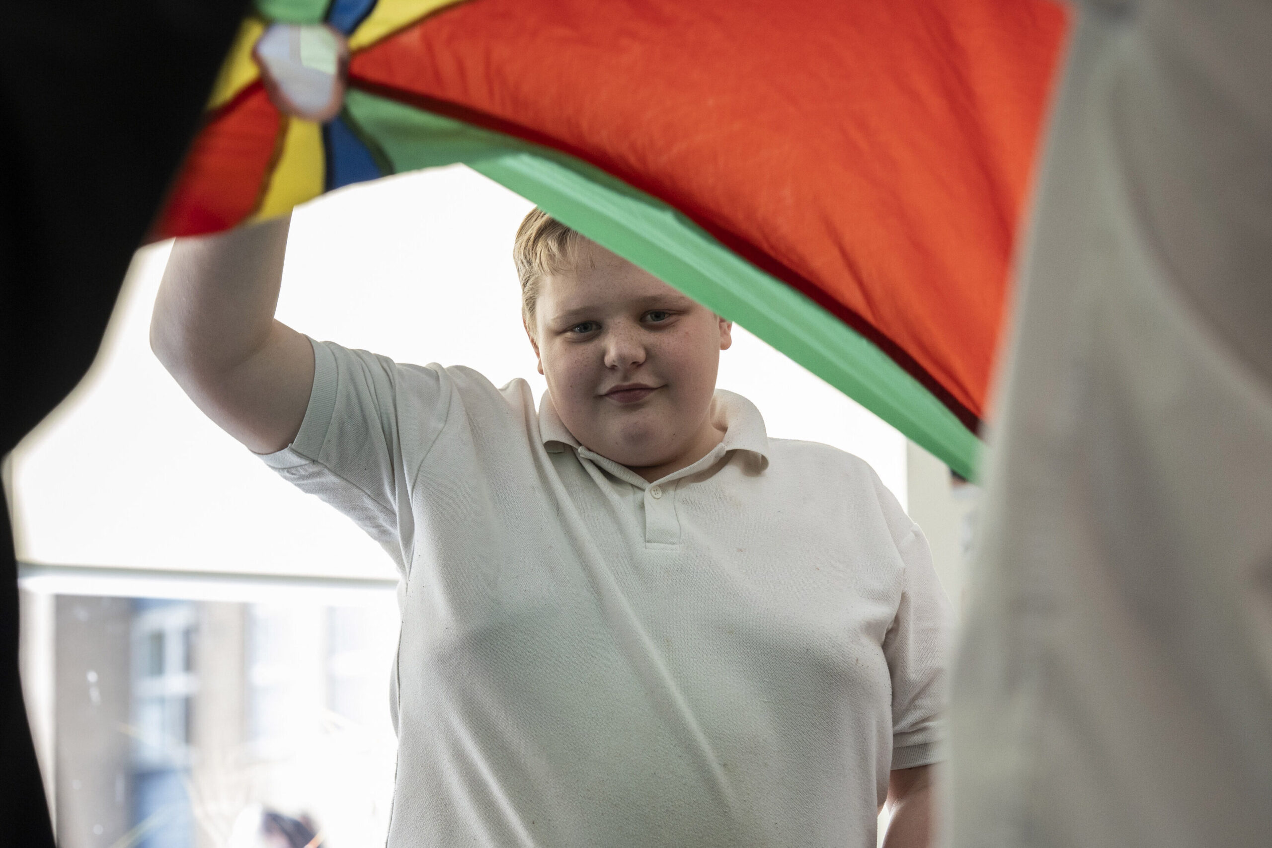 A learner taking part in a group activity during a lesson