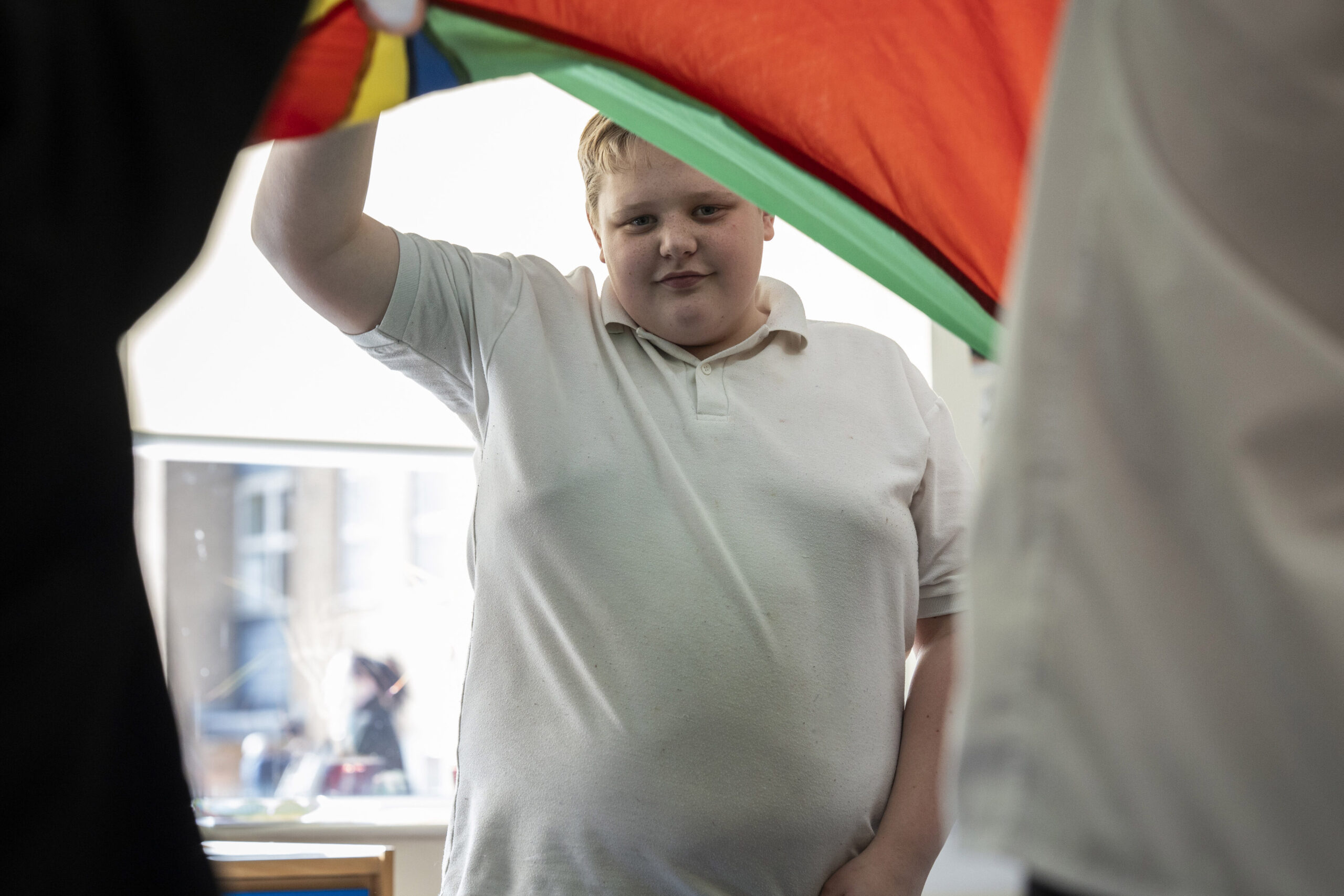 A learner taking part in a group activity during a lesson