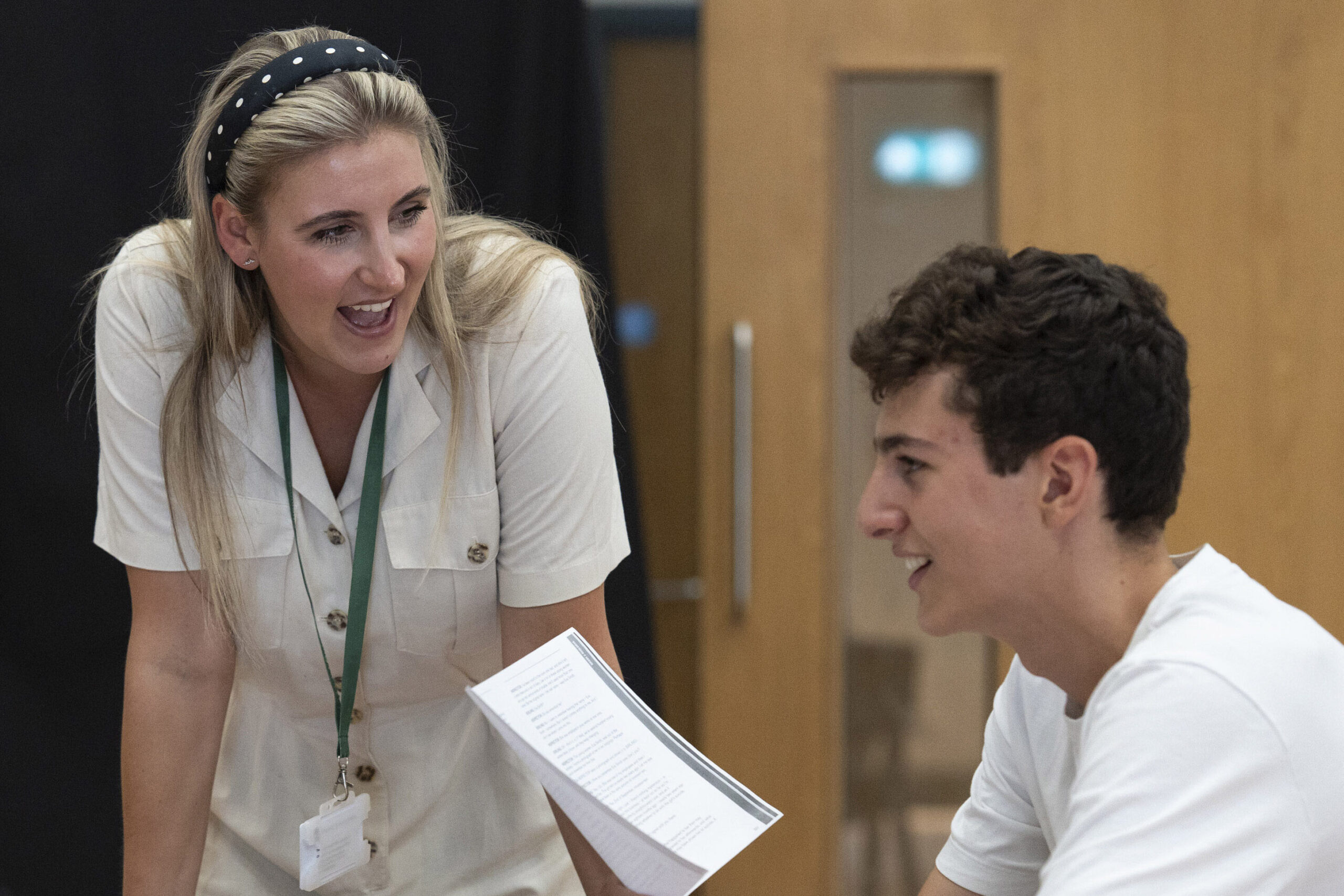 A learner and teacher at a table