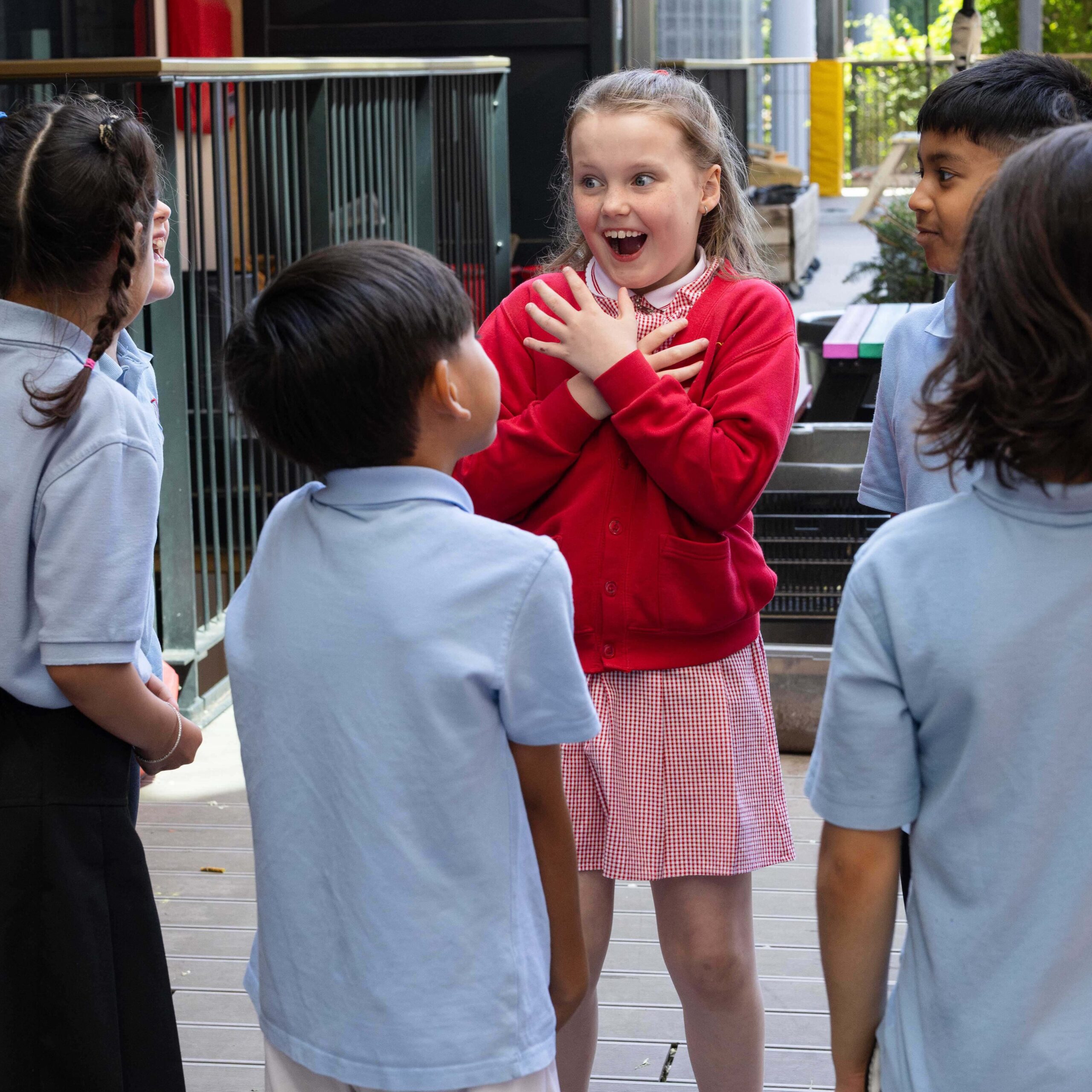 Six learners stand in a group